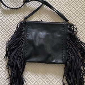 Carlos faux leather black fringed purse.